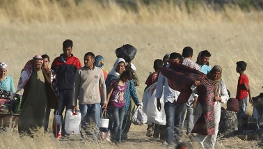 Kayıt dışılık, İstihdam, İşsizlik ve Kaynakların Dağılımı Bağlamında Geçici Koruma Altındaki Suriyelilerin Ekonomik Etkilerine Dair